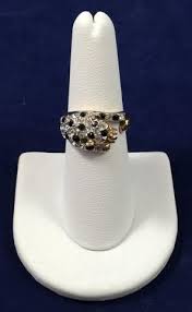 The ring is merely electroplated by 18karat gold and not made of 18k gold. Jaguar Cat 18k Gersc Goldplated Rhinestone Ring 345 Auction