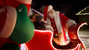 His waistcoat which has been embellished with a candy cane and peppermint sequin design. Covid 19 In Iowa Santas Take Precautions Still Spread Joy To The World