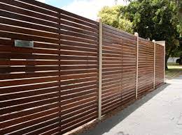 Horizontal slat style railing with or without wood top rail. 5 Designs To Modernize Your New Fence J W Lumber
