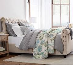 Three slat support system with adjustable center supports. Chesterfield Upholstered Bed With Footboard Pottery Barn