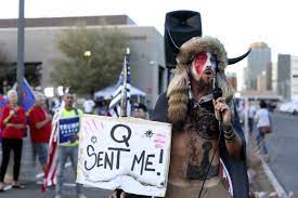 A prominent qanon figure knows as the q shaman was photographed in furs in the house chamber as trump fans jake angeli, known in q circles as the shaman for his face paint and furs, was part of. Qanon Shaman Granted Organic Food In Jail After Report Of Deteriorating Health Politico
