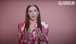 It's a biting minus one and she is standing in a chanel broderie anglaise sundress and increasingly soggy. Elizabeth Olsen On Why She Deleted Instagram