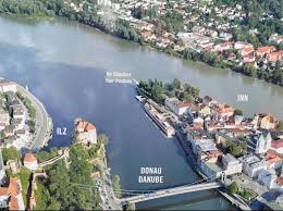 At the Three River Conjunction (Dreiflüsseeck) in Passau, Germany, one  river flows green (the Inn), one blue (the Danube), and one black (the  Ilz). : rMapPorn