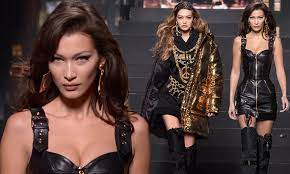 It looked like a deserted one. Bella Hadid Sizzles In Black Leather Mini Dress On The Moschino X H M Catwalk With Sister Gigi Daily Mail Online