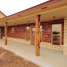 I couldn't help but chuckle when i cedar is a top choice for posts which can also be upgraded to a choice cedar which gives you a knotty finish. Live Edge Cedar Siding And Cedar Porch Posts By Wild West Creations Lodge House Cedar Porch Posts Porch Posts