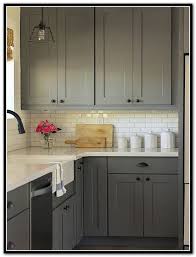 Grey cabinets white counters and gray wood floors can create a warm look. Kraftmaid Kitchen Cabinets In Maple Canon Grey Casual Contemporary Kraftmaid Kitchen Cabinets Maple Cabinet Door Sample In Moonshine 2 Foodbloggermania It