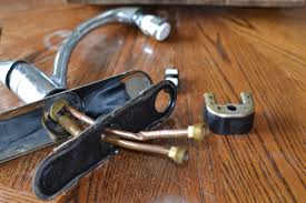 Remove the old faucet supply lines (image 1), which will expose the holes in the sink. Removing A Kitchen Faucet With U Bracket Sonya Burgess