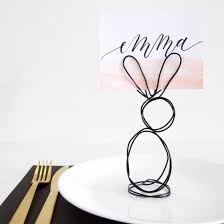 I'm so excited to share these diy place card holders with you! Diy Wire Bunny Place Card Holders Colorful And Fun Easter Decorations You Ll Want To Leave Up All Year Livingly