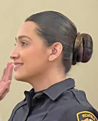 Three police officers take the oath