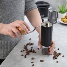 Removable grind chamber holds enough ground coffee for 32 cups. Black Oak Handheld Grinder