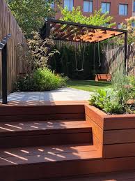 Designing a low water use yard. Modern Kid Friendly Backyard With A Small Playground