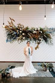 Each bouquet has 7 stems. Hanging Flower Installations Elevate An Alternative Wedding Hey Wedding Lady