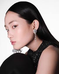 Writer Anne Berest wore a black top paired with a white silk skirt from the  CHANEL Fall-Winter 2020/21 Ready-to-Wear collection at the annual CHANEL  and Madame Figaro dinner for the Deauville American