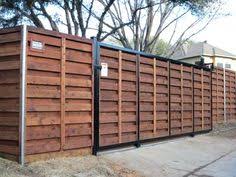Modern fence gate design is here to stay. 11 Sliding Gate Fence Ideas Fence Sliding Gate Backyard Fences