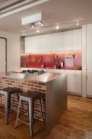 Never use a textured laminate for a kitchen counter; Kitchen Island Ideas Dwell