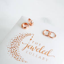 You can pick serpentine snake hoop earrings for making a strong style statement or can consider it is an online place where you can buy silver earrings for girls in india. How To Choose The Best Earrings For Babies The Jeweled Lullaby