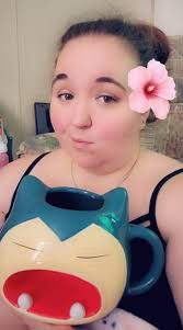 Giant snorlax mug of iced coffee for me this morning. Need motivation to  fold the mountain of laundry that has over taken my couch.