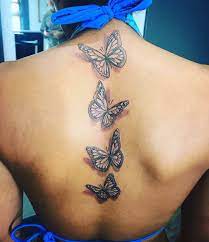 Luis Lopez Is Back At It Literally With This Stunning Butterfly Back Tattoo Design To Start The Day Prima Butterfly Back Tattoo Tattoos Hip Tattoo Designs