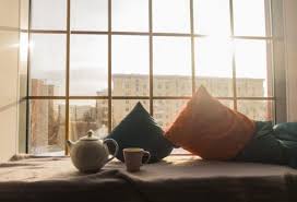 Cushioned window bench and bookshelf; 36 Cozy Window Seats And Bay Windows With A View