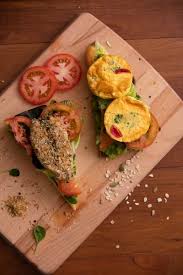 Left Oven Baked Barramundi Kraftwich Barramundi Fillet Coated With Bread Crumbs On Maize Bread With Pumpkin Seeds Toppings Right Fr Healthy Eating Eat Food