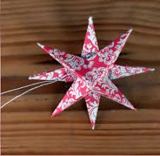 Learn how to fold an origami star with instructions below. Star Festivel Paper Star Ornament Paper Origami Guide