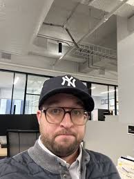 Office dress code in today's Post Covid world has certainly skewed more  comfortable than the days where full suits and dress shoes were the norm.  That typically doesn't mean hats in the