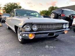 Image result for Platinum Gray 1961 Cadillac