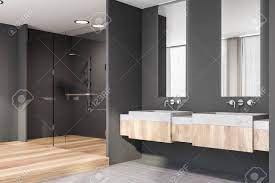 Continue to 2 of 15 below. Corner Of Modern Bathroom With Grey Walls Tiled And Wooden Floor Stock Photo Picture And Royalty Free Image Image 128362657