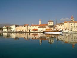 A view through a bell tower window gives a viewpoint of the trogir old town. Town Of Trogir Split Croatia Travel Guide
