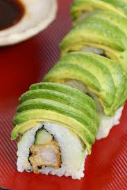 Cut the tip off one half. Dragon Roll Sushi Shrimp Tempura Roll With Avocado Topping