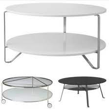 Reclaimed wood industrial rustic coffee table cart on iron wheels within glass coffee tables with casters view photo 16 of 30. Ikea Round White Glass Coffee Table On Wheels Novocom Top