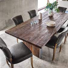 We really are impressed by lagostina. The Keith Dining Table Merges Worlds Old And New This Rustic Modern Dining Table Is Well Bal Modern Rustic Dining Table Dining Table Rustic Rustic Dining Room