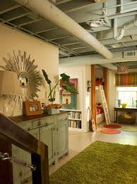 When it comes to decorating ideas, the industrial look is in, which lends itself well to dressing up the subterranean infrastructure of a an unfinished basement. Building Simple Basement Remodel Painting The Exposed Ceiling Basement Makeover Basement Decor Basement Remodeling