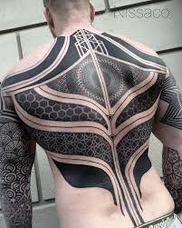 Is a blackout tattoo a cost effective. Blackout Tattoo Trend Cloaks The Body In Black Ink To Make A Bold Visual Statement