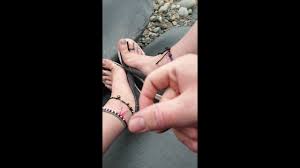 Beach walk in chastity with foot cum
