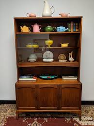 Their blog is a wealth of information on these sorts of pieces. Vintage Mid Century Modern Lane Rhythm Walnut China Cabinet Epoch