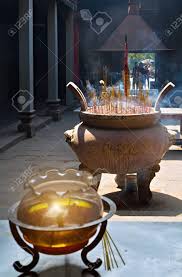 Wood or paper or plastic incense holder on fire, and burn down your house c. Burning Incense Sticks With Smoke In Large Joss Stick Pot Joss Sticks Burning At A Vintage Buddhist Temple Chinese New Year Smoke Use For Pray Respect To The Buddha Stock Photo Picture