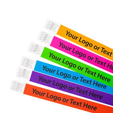 Silicone rubber bracelets and wristbands packaging mockup. 3 4 Tyvek Wristbands With Black Print Cintapunto