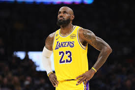 LeBron James in Lakers jersey looking thoughtful
