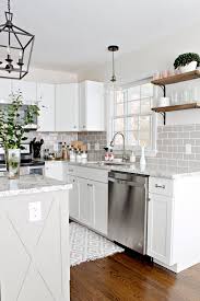 This hardiplank shiplap kitchen features white paneling around the room. Diy Kitchen Island X Trim Cheap Cabinet Makeover Elizabeth Burns Design Raleigh Nc Interior Designer