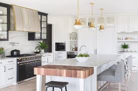 A separate dining table is place on the far side. Kitchen Island Extension Design Ideas