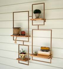 Twisted gold metal shelf glass and antique gold wall shelf pamscrafts7631 5 out of 5 stars (2,460) $ 26.00. Gold Finish Metal Wall 4 Shelf Unit Vivaterra