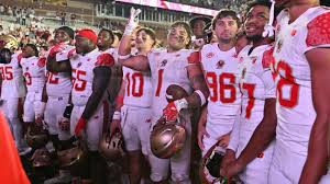 Boston College players honor Welles Crowther during the Red Bandanna Game