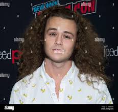 Jack Perry aka Jungle Boy attends New York Comic Con to promote TNT's "All  Elite Wrestling: Dynamite" at the Jacob K. Javits Convention Center