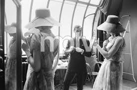 Dior designer Marc Bohan with fashion models wearing ensembles from  Spring-Summer 1961 Haute Couture collection, Slim Look line1961© 2013 Mark  Shaw