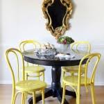 modern white kitchen with yellow chairs