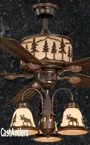 The fans themselves come in many styles and sizes, too. 56 Lodge Rustic Cabin Country Ceiling Fan W Light Kit Bearmoosedeerpinetree Ceiling Fans Ideas Of Cei Country House Decor Rustic Ceiling Fan Rustic House