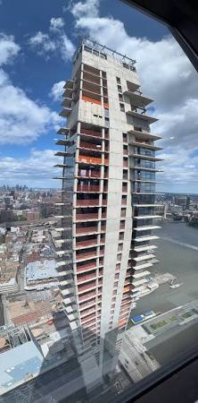 Waterfront commercial tower development, AI generated