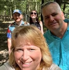 How to report a fake Facebook profile impersonating me?