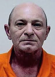 Hancock man charged in roommate's death